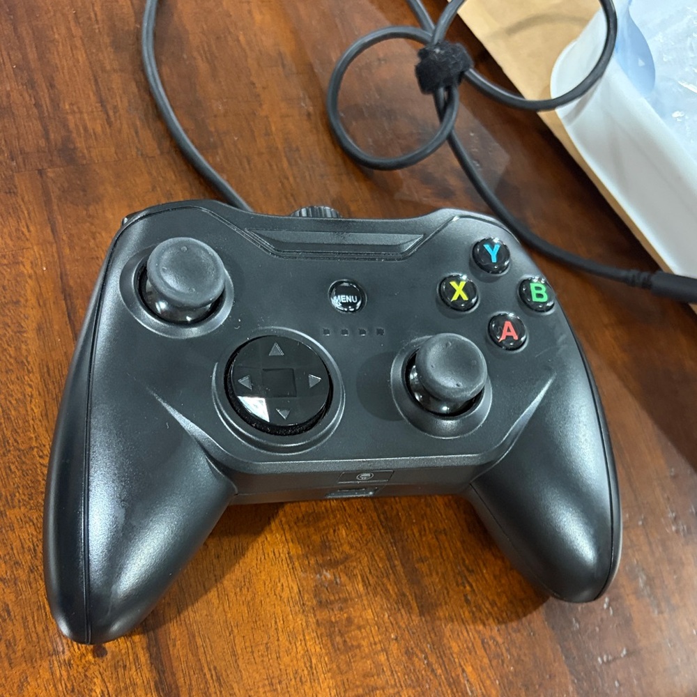 Black wired controller for iPhones